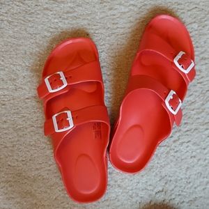Red two-strap sandals
